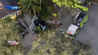1 airlifted, 3 others hospitalized after vehicle crashes through fence outside home in North Miami
