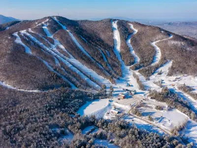 A 60-year-old NH ski area is bought by close friends who grew up skiing there