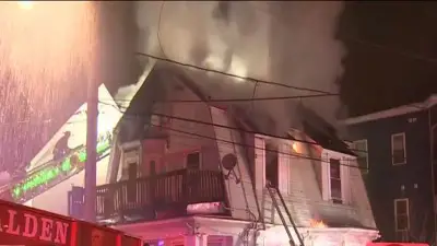 Firefighters battle multi-alarm house fire in Malden