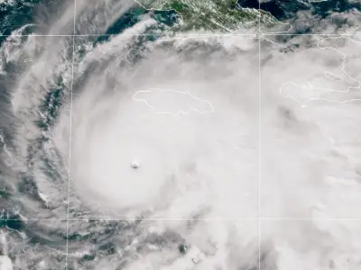 3 maps showing Hurricane Melissa’s track, timing, wind speeds, and rainfall