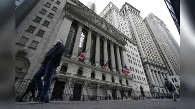 Wall Street edges back from its record heights