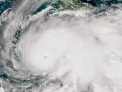 3 maps showing Hurricane Melissa’s track, timing, wind speeds, and rainfall