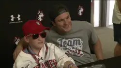 Northeastern University men’s hockey hosts special signing ceremony for 11-year-old