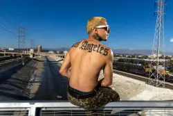 Stunt bike influencer takes followers 'behind the tent zipper' in L.A. encampments