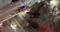 Tow truck plunges off overpass on Route 140 in Freetown, killing driver