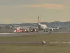 Plane stops takeoff at Logan Airport after shooting flames, smoke